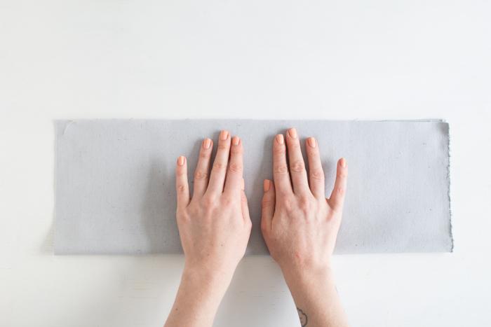 Сложите ткань